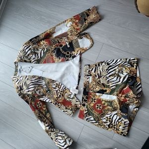 Outfit new tags jacket large and shorts medium